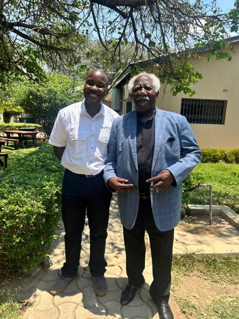 Ambassador Mumba Kapumpa with Mawano Kambeu in the gardens at Dot Com Zambia